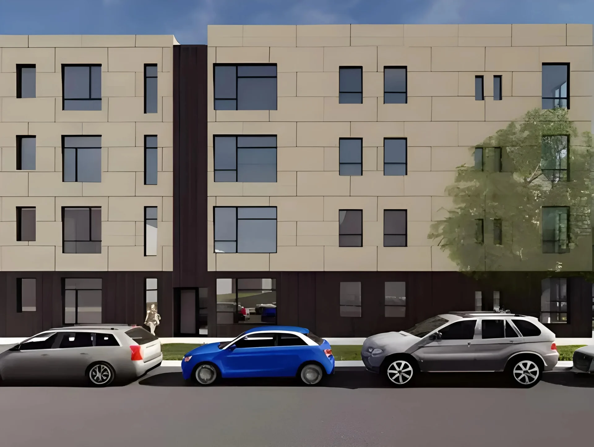 A modern four-story apartment building with a beige facade and large dark-framed windows. Four cars are parked in front: a silver sedan, a blue compact car, a gray SUV, and another silver vehicle. A small tree is seen on the right side of the building.